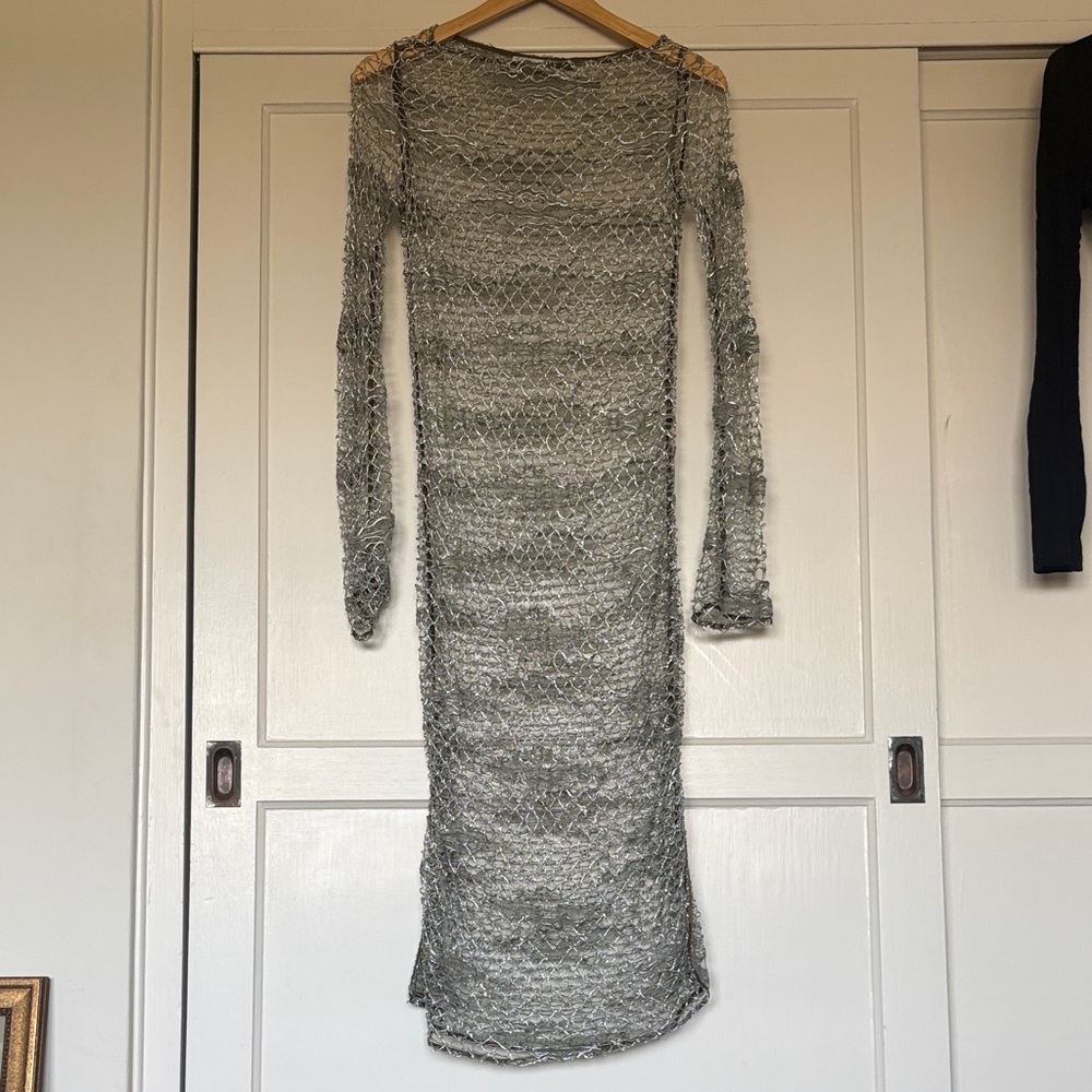 Agnes B. Silver mesh long tight dress. Slits on either side of about 14 inches.